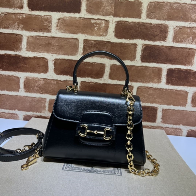 G*u*i top handle bags